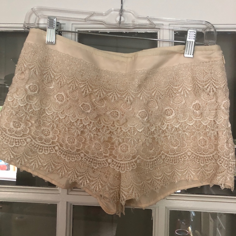 Boutique brand off white lace shorts size small.